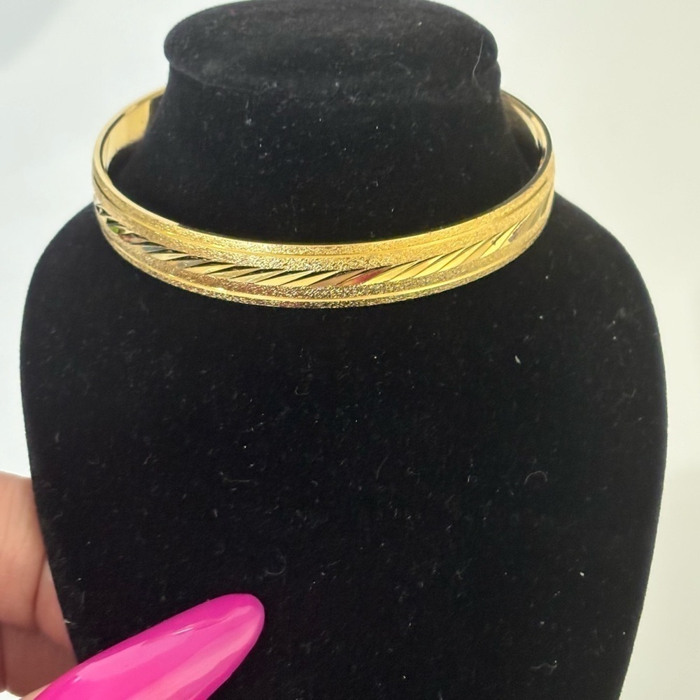 Trifari gold tone etched bracelet